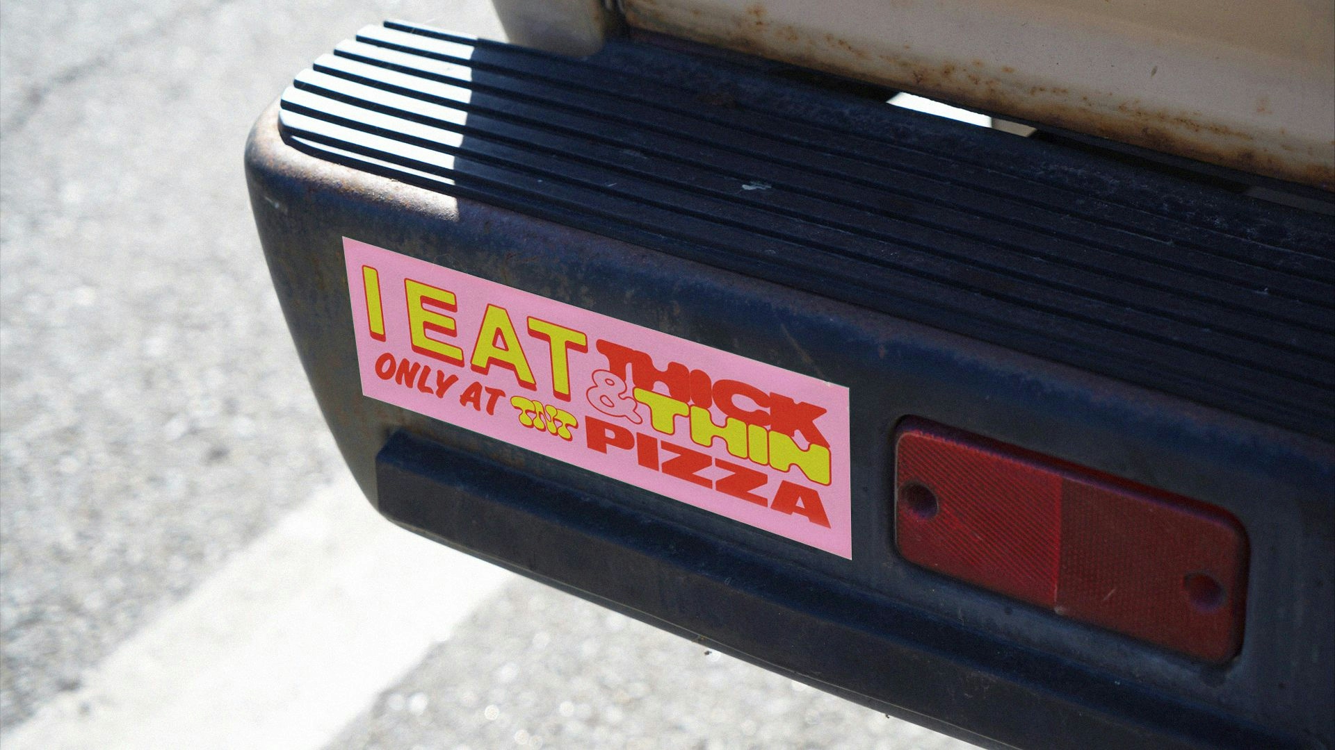 TNT Pizza pink bumper sticker from the Brand Identity & Packaging project
